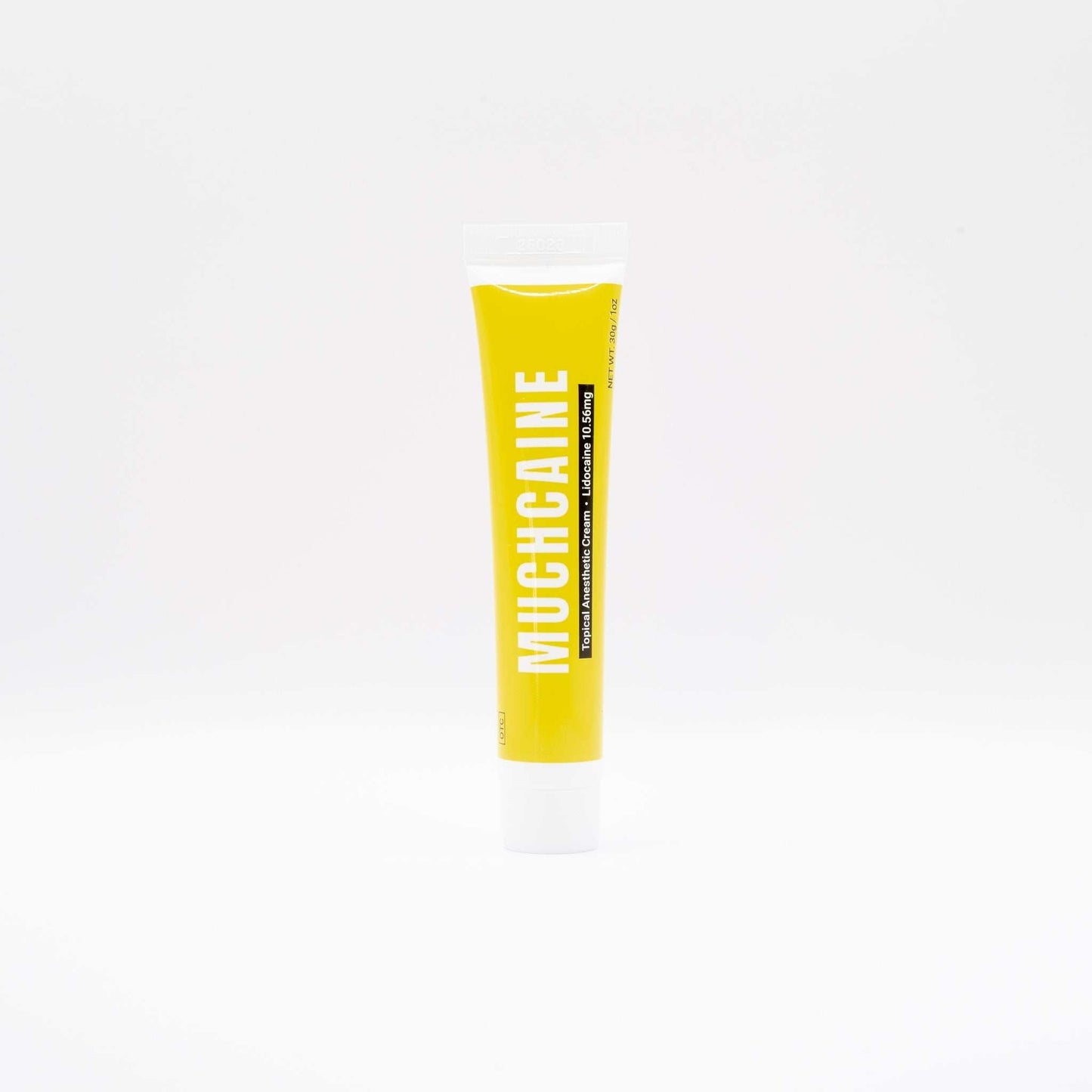 Yellow tube of numbing cream included in Salmon DNA Microneedle Bundle for skincare treatment at home