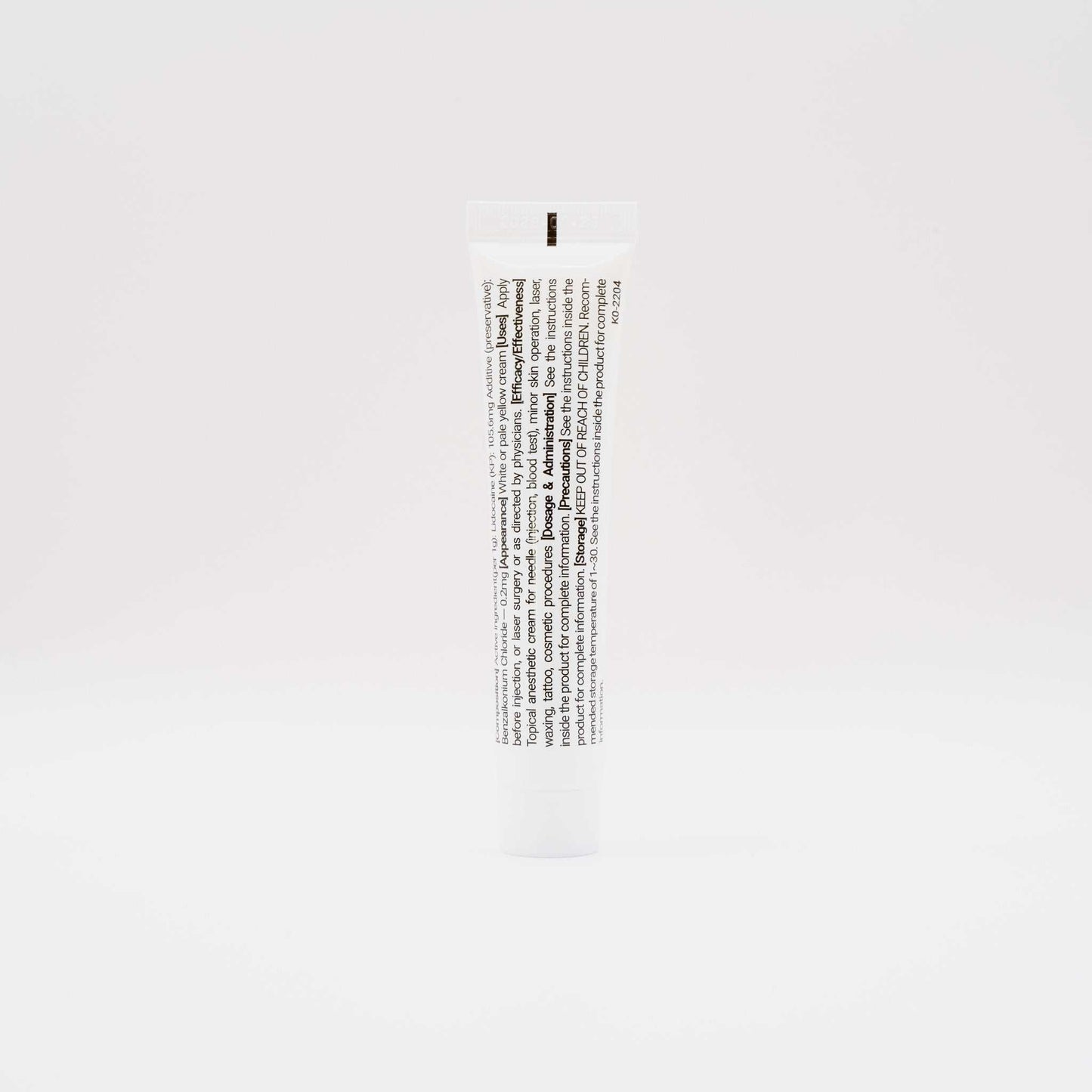 Numbing cream tube from Salmon DNA Microneedle Bundle on white background