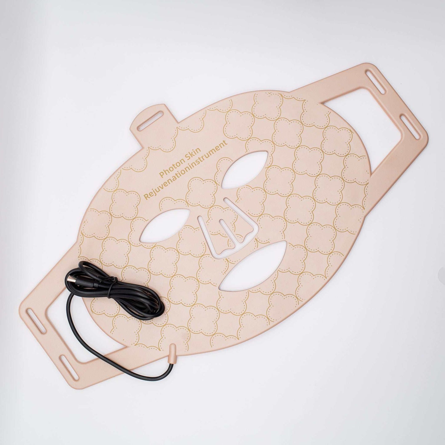 Beige dual near infrared and LED red light therapy face mask with adjustable straps and connecting cable for skin rejuvenation and anti-aging treatment.