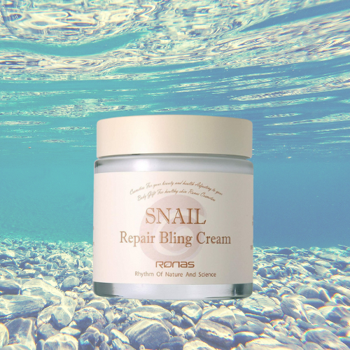 Rona’s Snail Repair Bling Cream jar with ocean background, enhancing skin hydration and radiance.