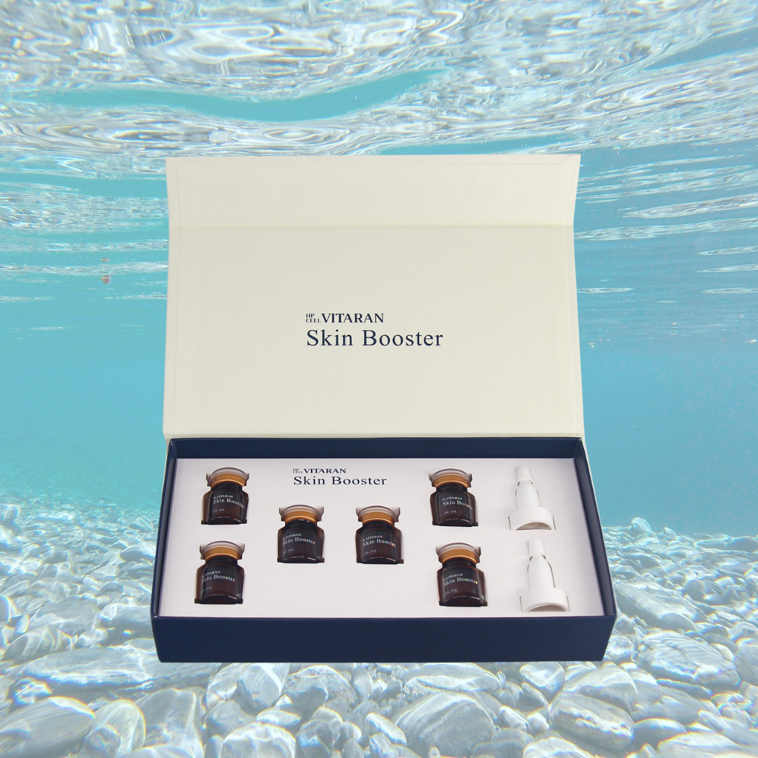 HP Cell VITARAN Salmon DNA Skinbooster set with vials in open box against underwater background.