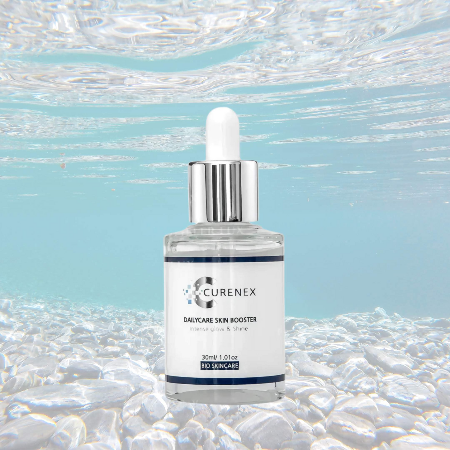 Curenex Salmon DNA Daily Skincare Bundle with serum against underwater background.