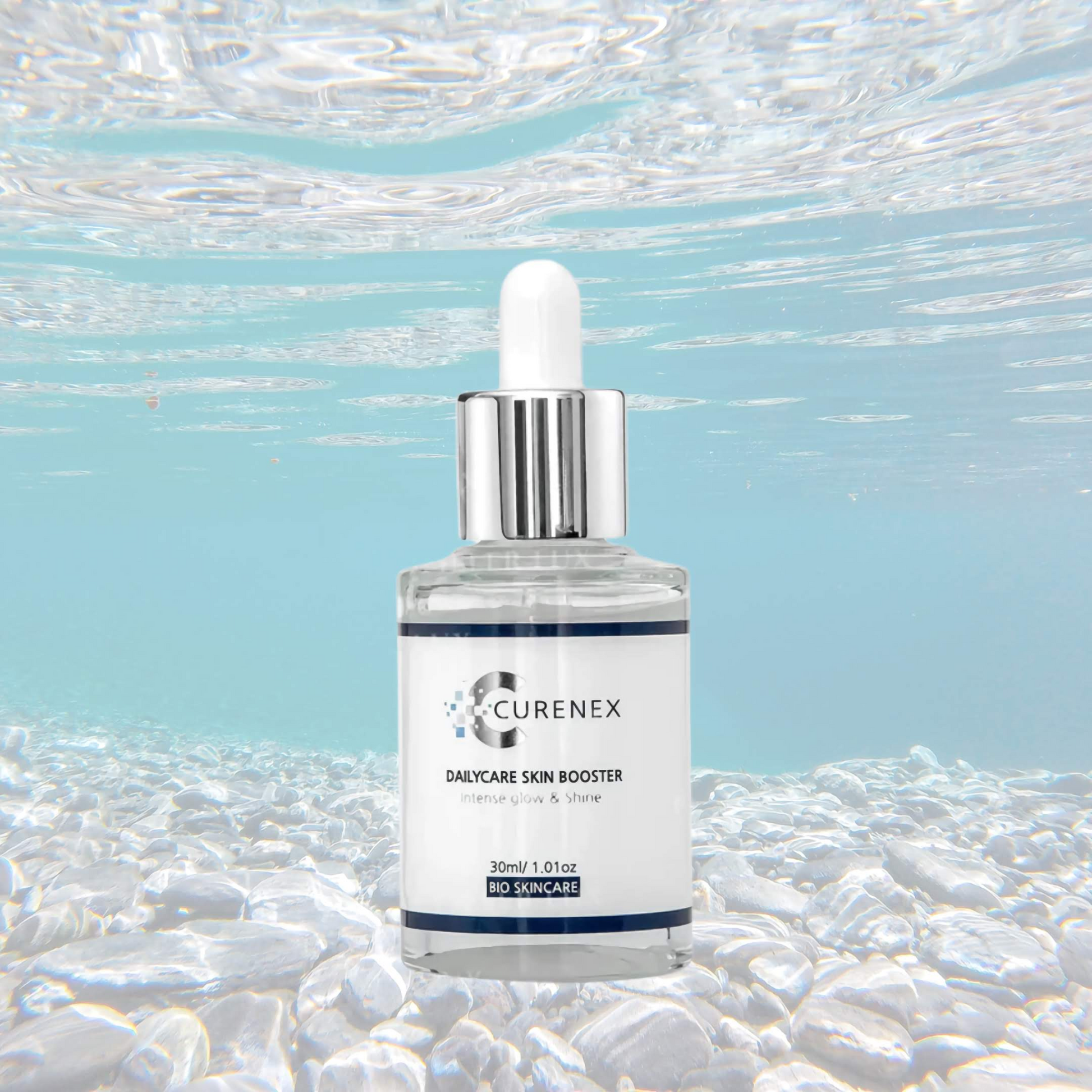 Curenex Salmon DNA Daily Skincare Bundle with serum against underwater background.