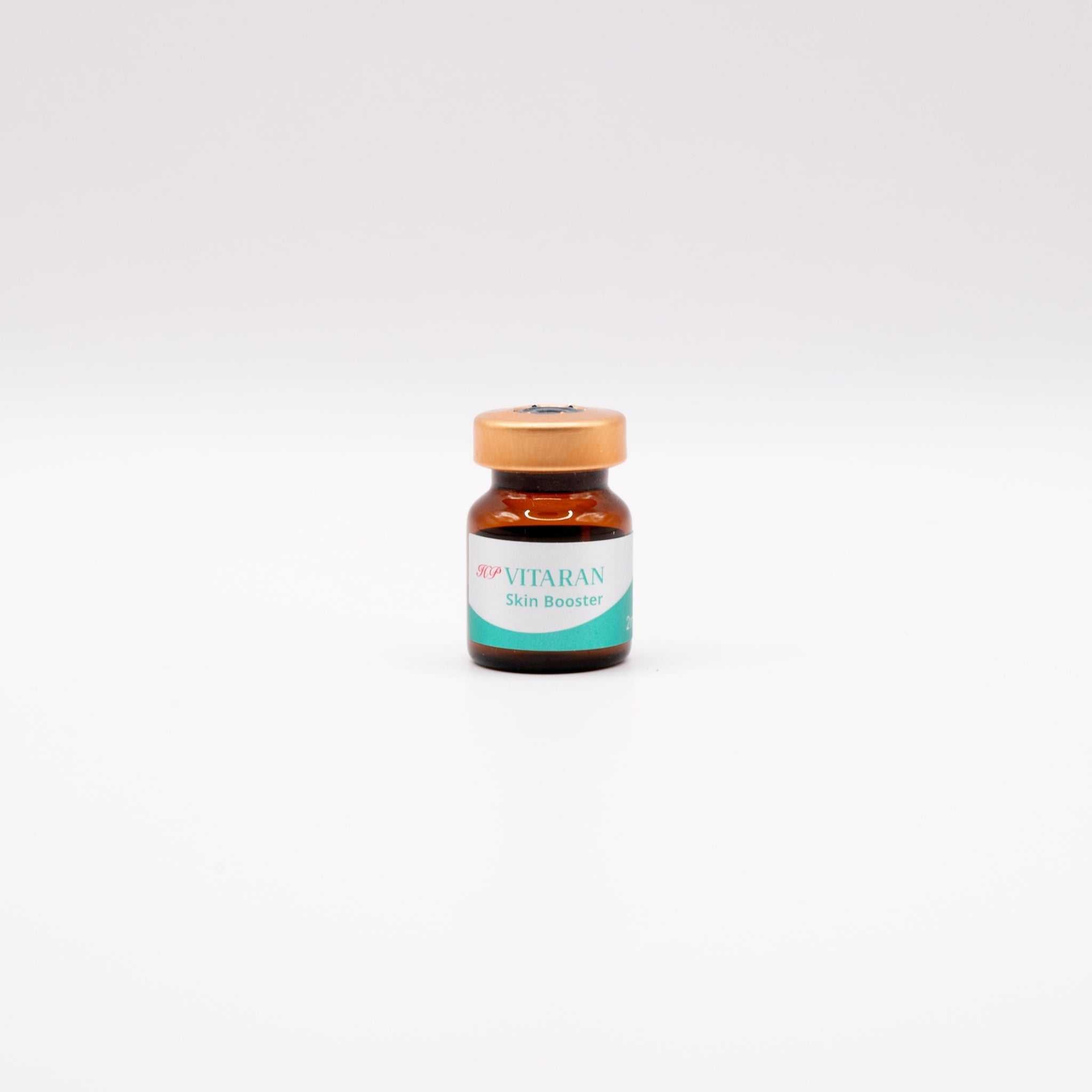 Small amber vial of HP VITARAN Salmon DNA Skin Booster with HA for microneedling and skin rejuvenation treatments