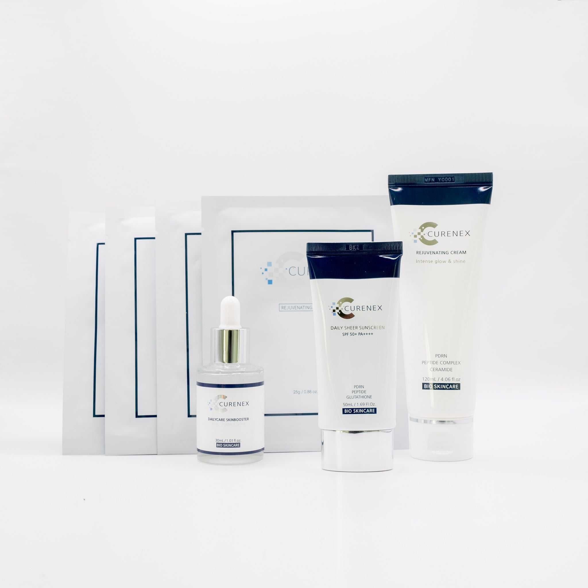 Curenex Salmon DNA Sheer Sunscreen SPF50+ with skincare products set on white background