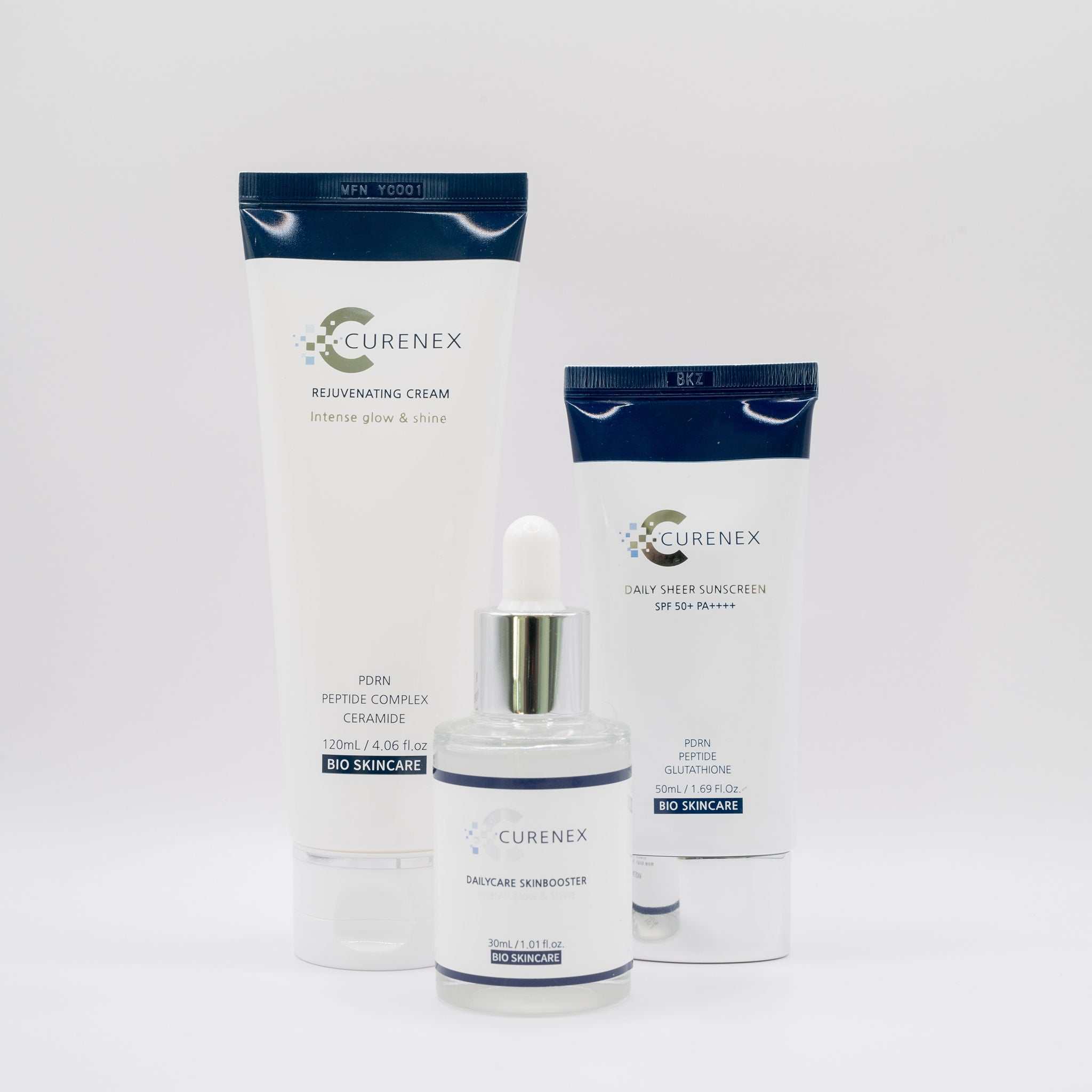 Christmas Glow Salmon DNA Radiance Set by Curenex featuring rejuvenating cream, daily care skin booster, and sunscreen for glowing, hydrated skin
