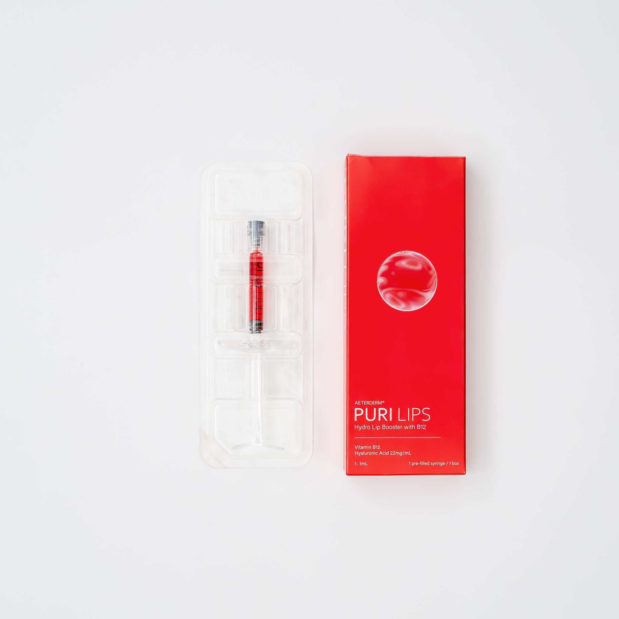 Puri Lips Hydro Lip Booster syringe and red packaging for semi-permanent scarlet lip tint and hydration
