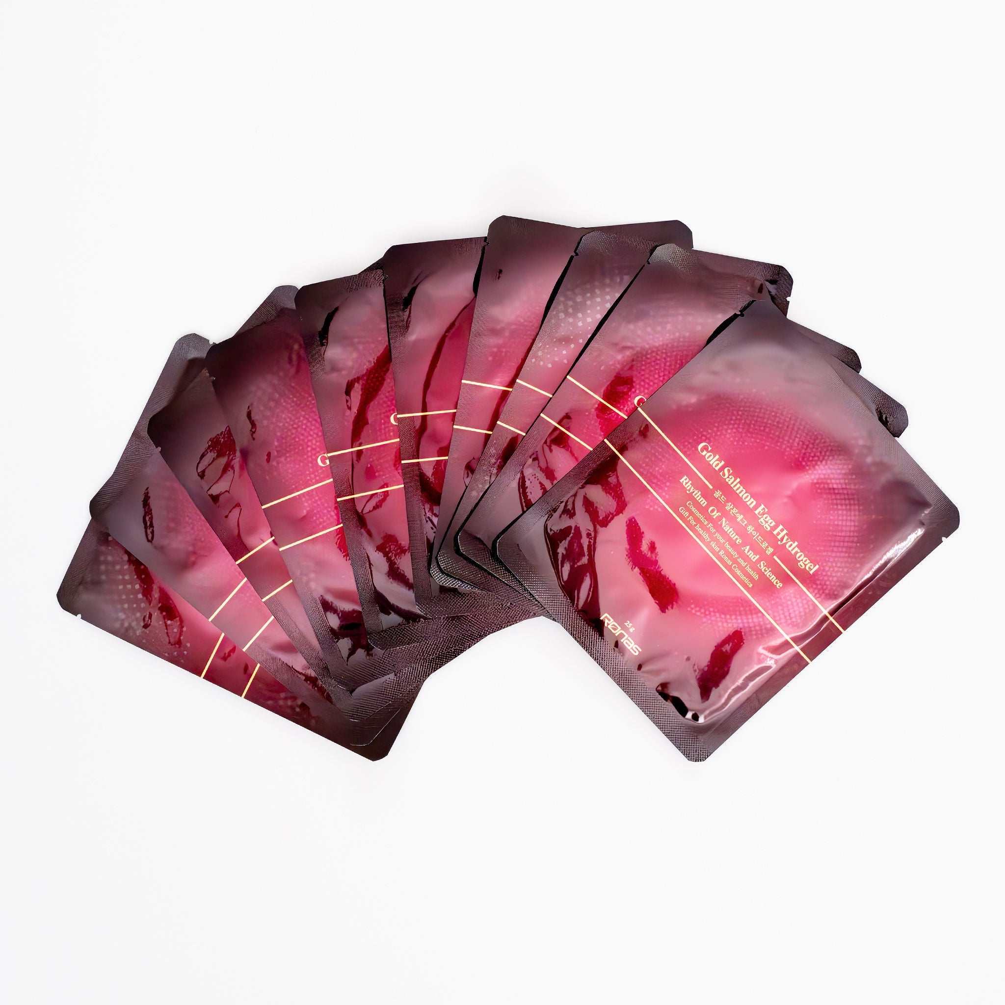 Pack of RONAS Gold Salmon Egg Hydrogel Masks in purple and gold packaging for deep hydration, firming, and brightening skincare.