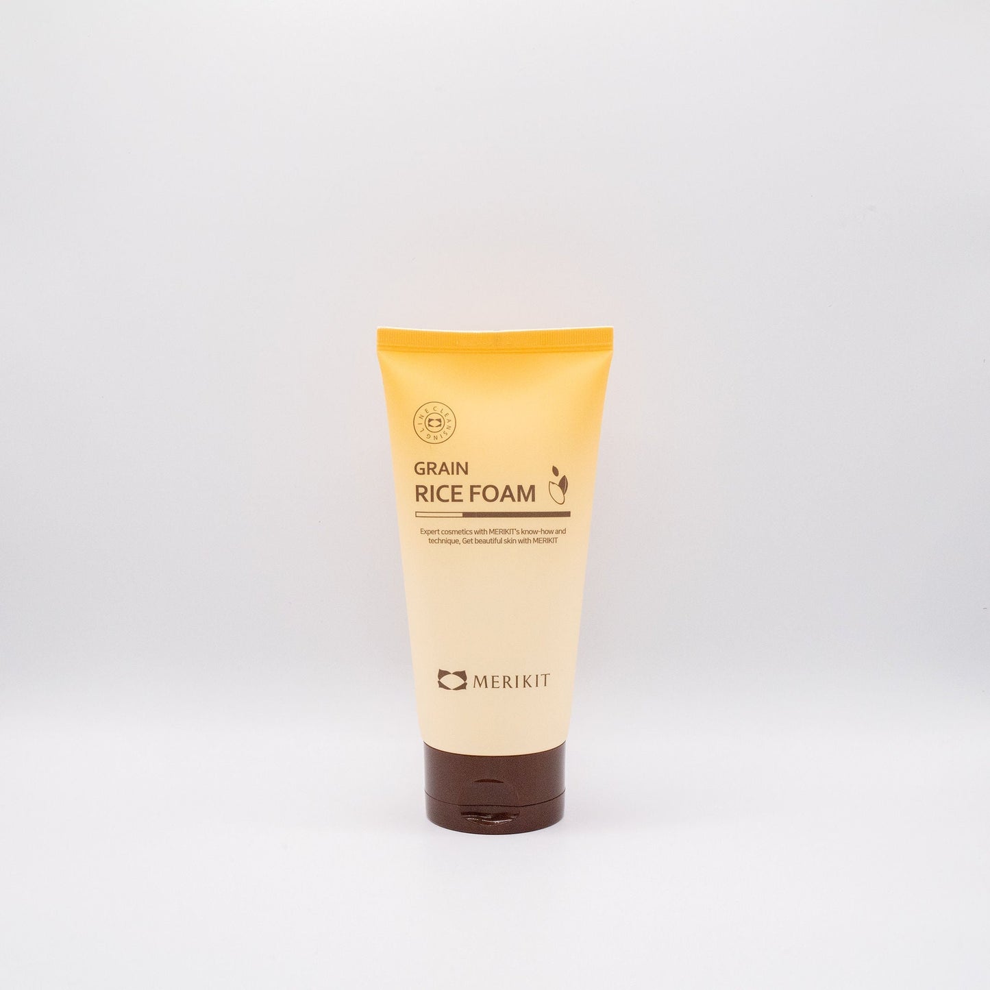 Merikit Grain Rice Foam cleanser tube with yellow and brown packaging on white background