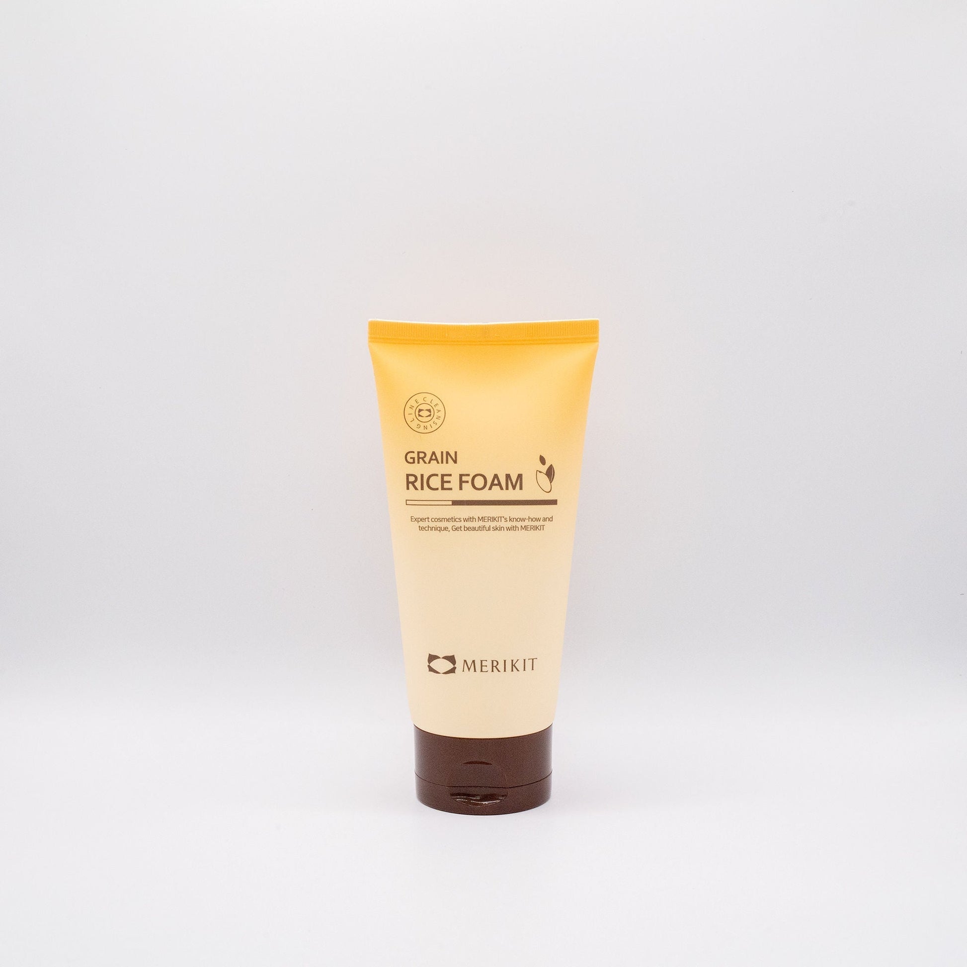 Merikit Grain Rice Foam cleanser tube with yellow and brown packaging on white background