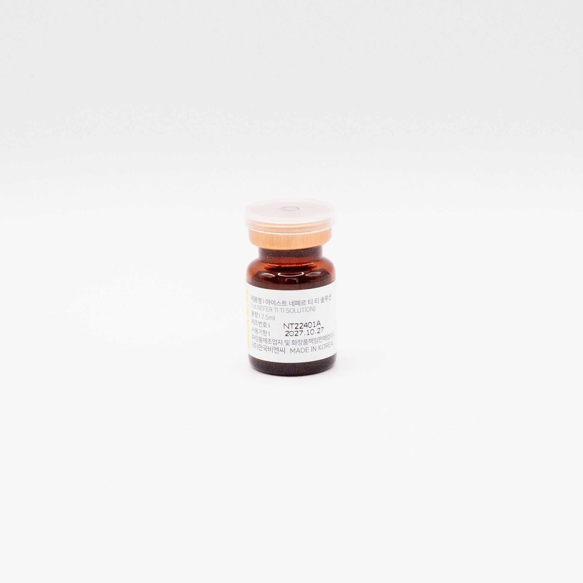 Small amber vial of 1.st NEFER TI TI skinbooster solution for anti-aging and skin hydration