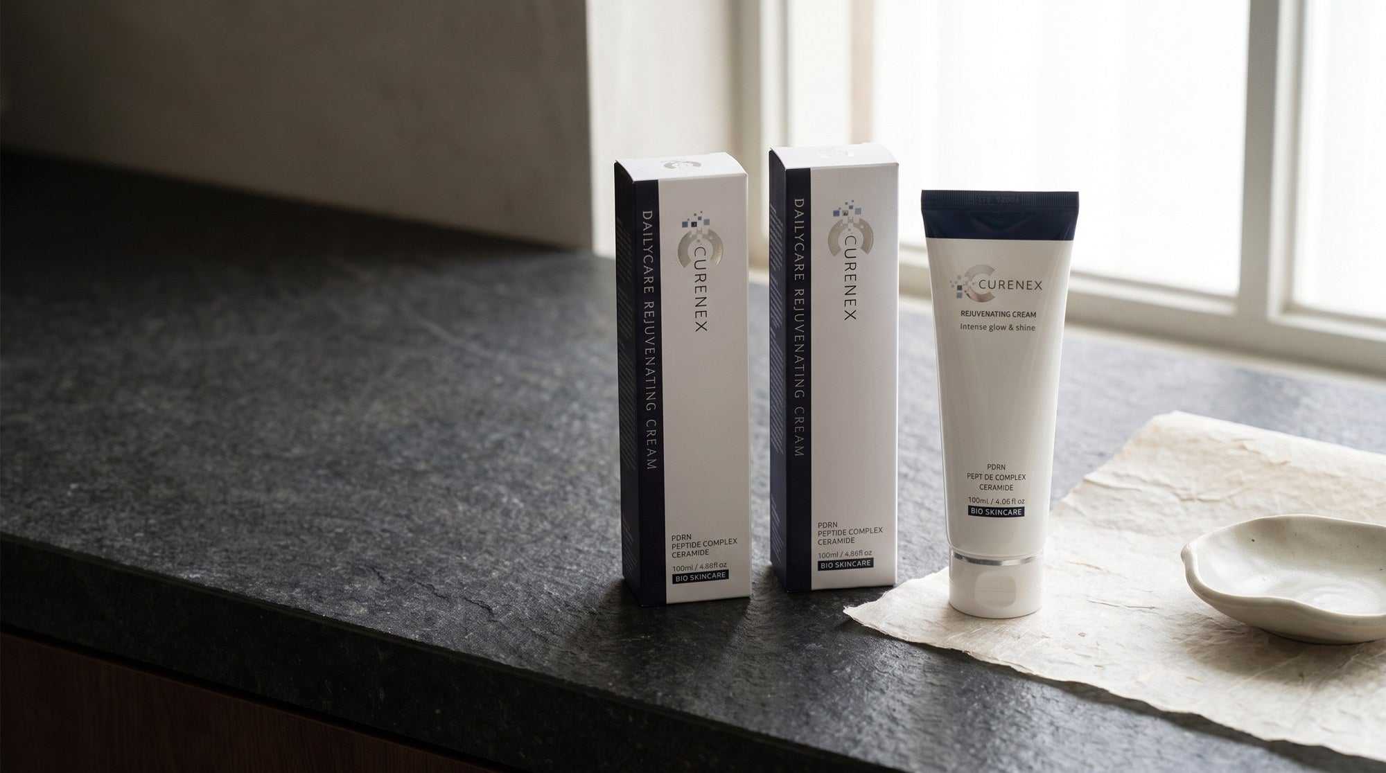 Curenex rejuvenating face cream origin scene styled in soft natural light