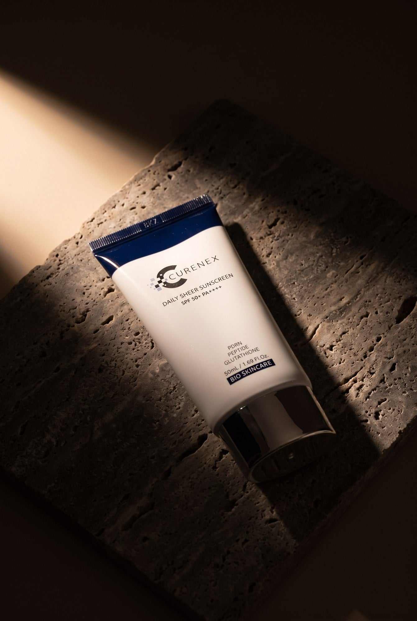Curenex Sheer Sunscreen mobile hero showing the sheer SPF50 daily sunscreen