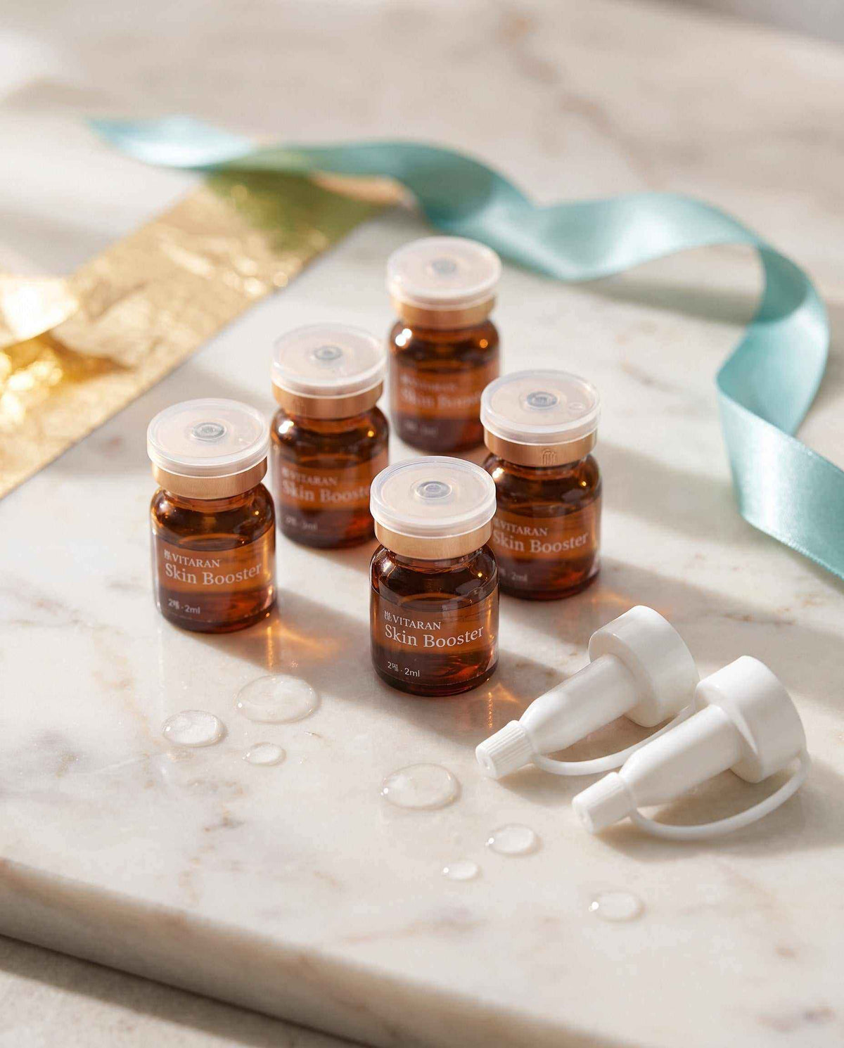 HP Cell VITARAN Salmon DNA Skin Booster serum bottles