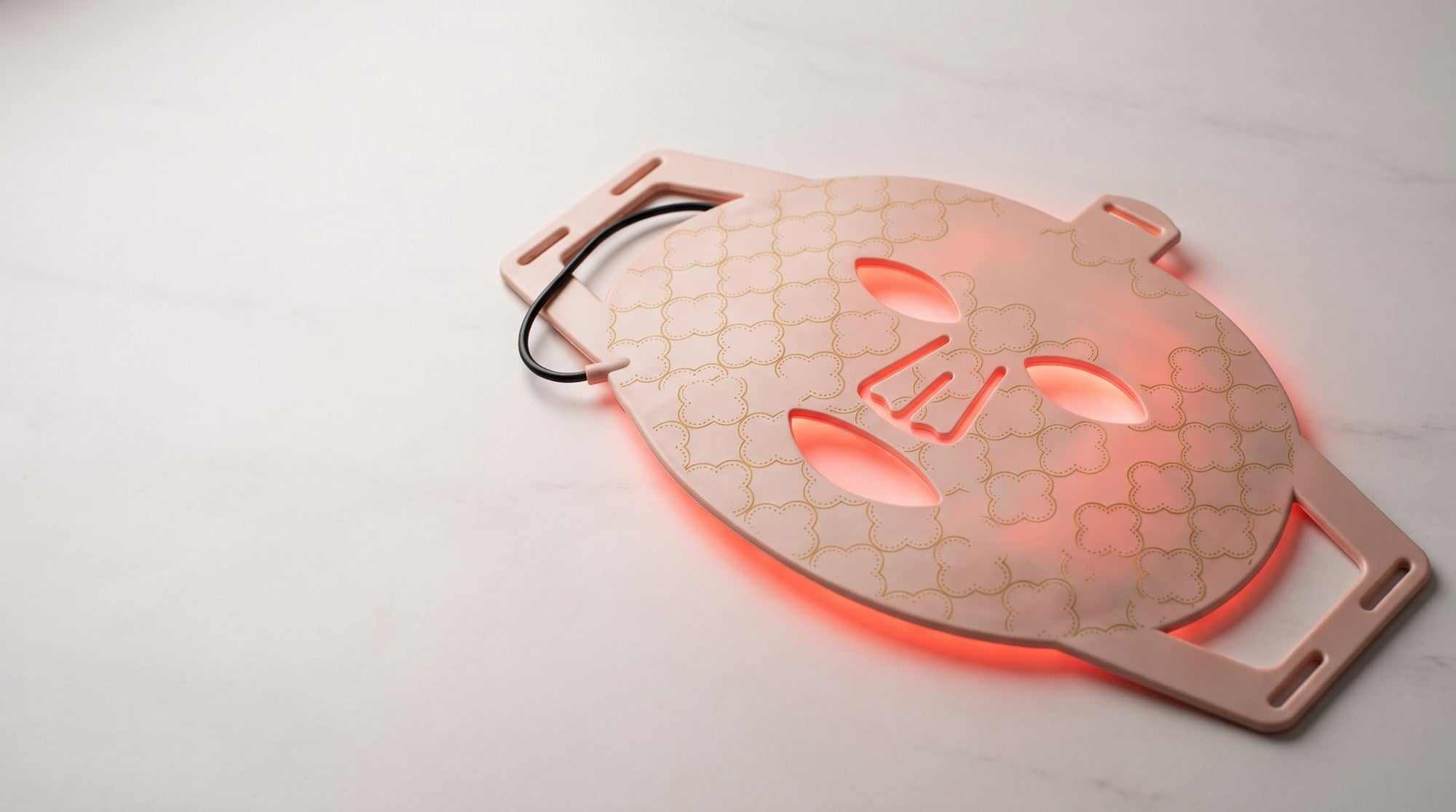 Dual near infrared and red light LED face mask hero banner for at home glow rituals