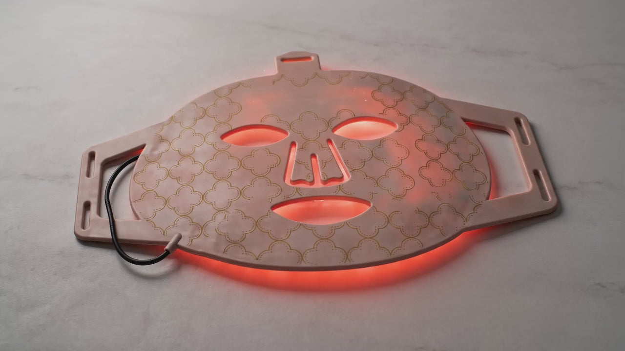 Load video: Dual near infrared and red light LED face mask hero b roll of the beauty device