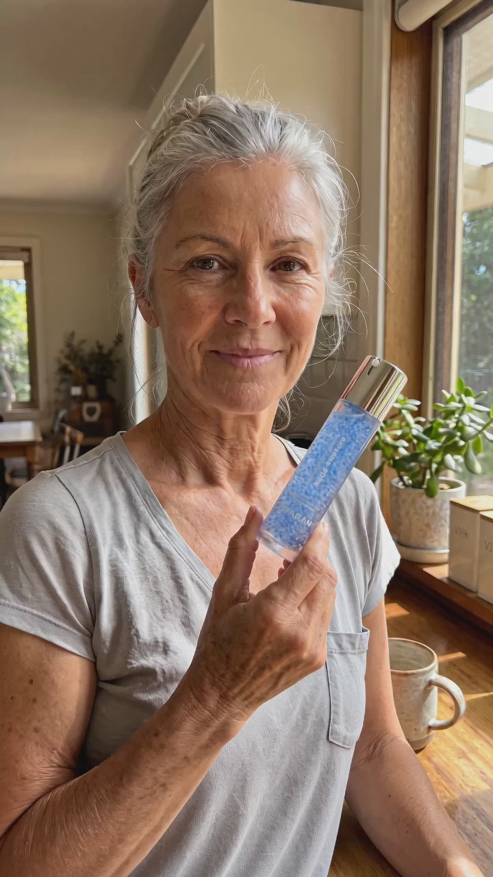 Vitaran Morning and Night Serum Duo customer clip layering serum onto plump skin