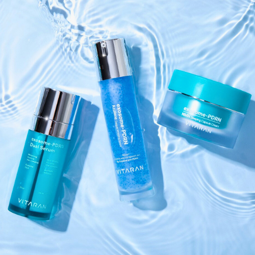 VITARAN Three Step Daily Salmon DNA Skin Healing Bundle products on a watery surface.