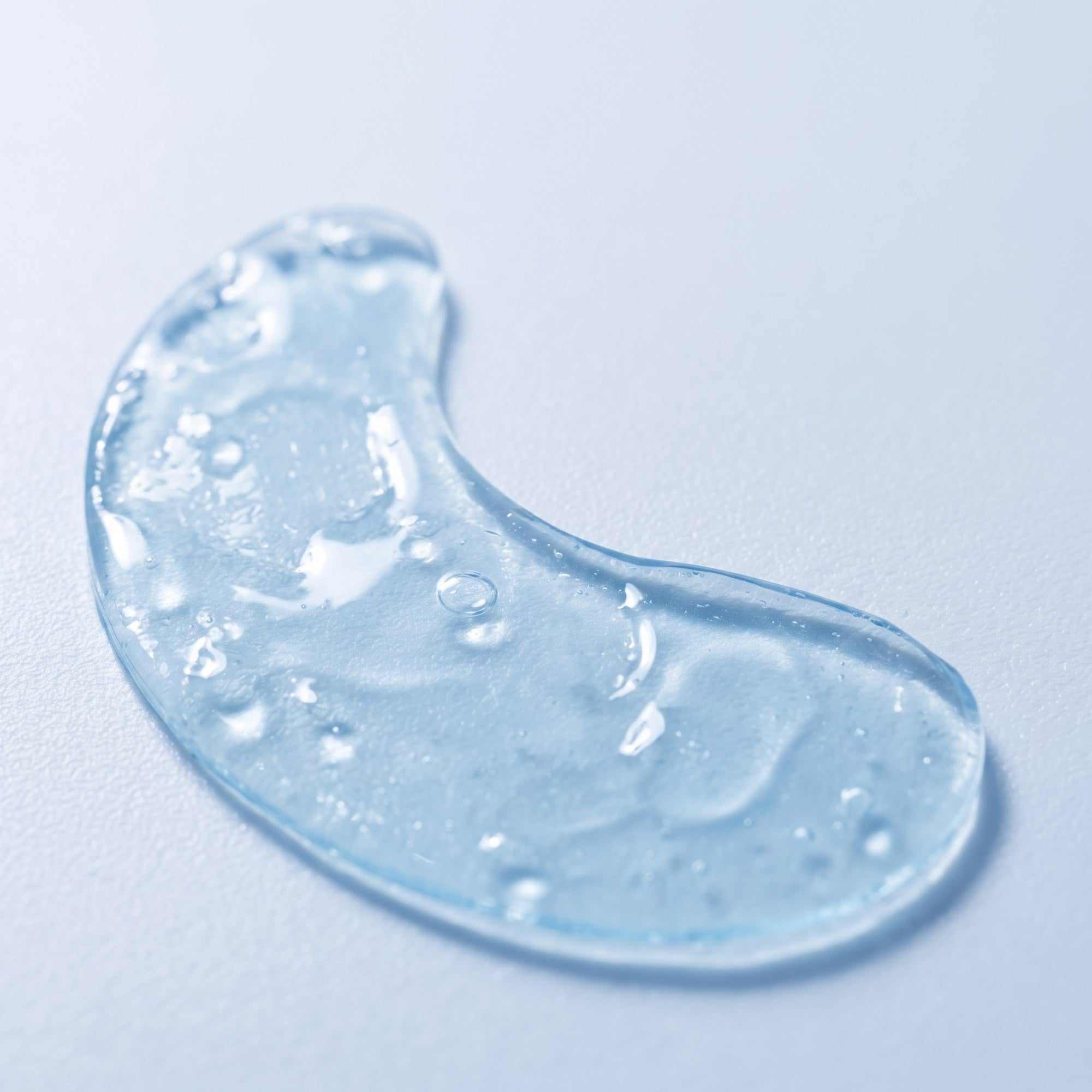Puri Eyes PDRN Patch close up showing the cooling hydrogel patch shaped for under eyes