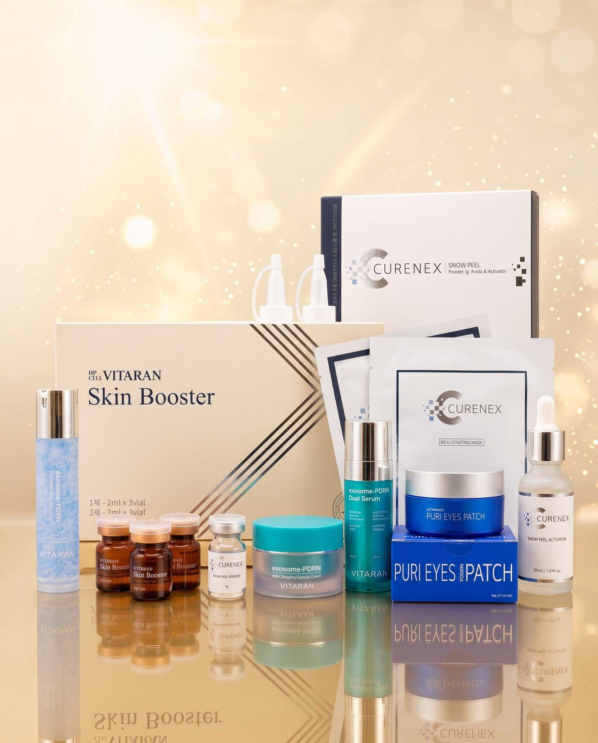 Vitaran Full System Kit skincare set with white and teal packaging, serum bottles, jars, eye patches and sheet masks