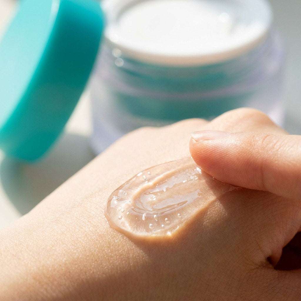 The Overnight Salmon DNA Spicule Snow Peel and Salmon DNA Capsule Cream skincare set on white background