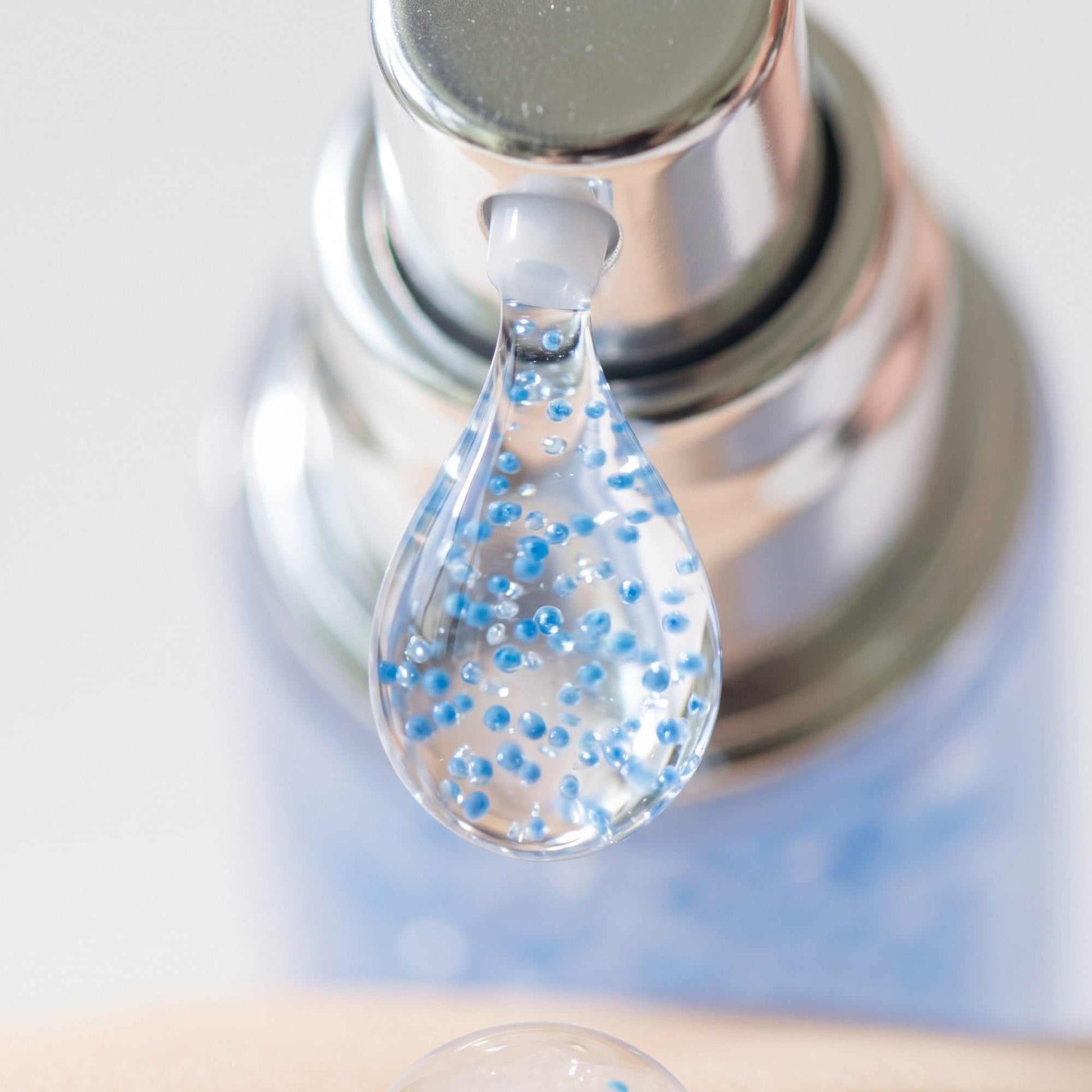 VITARAN Day and Night Duo azulene serum texture close up showing silky exosome formula