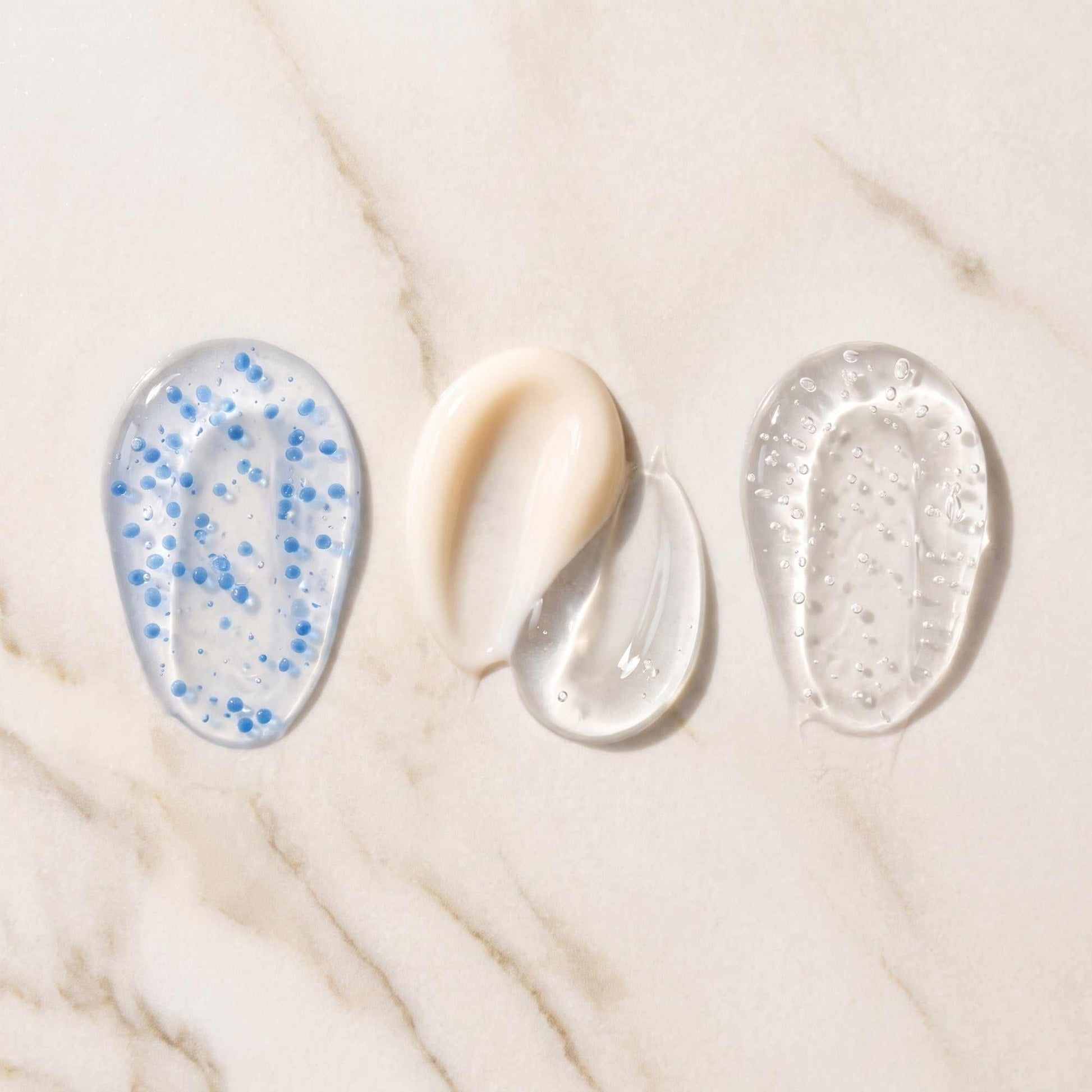 Complete Vitaran Collection product textures showing rich serums and creams